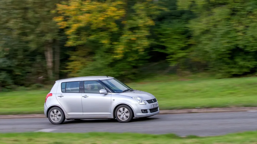 Milton,Keynes,uk,-,Oct,28th,2023:,2009,Silver,Suzuki,Swift